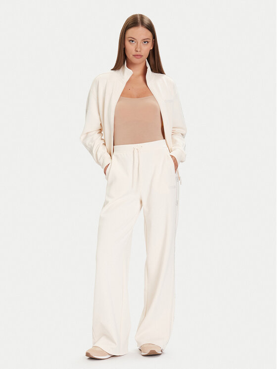 Guess Guess Spodnie dresowe V5BB12 KCX22 Beżowy jasny Wide Leg