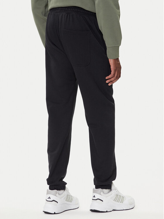 adidas adidas Pantaloni trening ALL SZN Fleece IX1246 Negru Tapered Leg