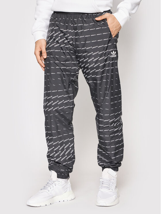 adidas Teplákové nohavice Graphics Monogram H13484 Čierna Regular Fit