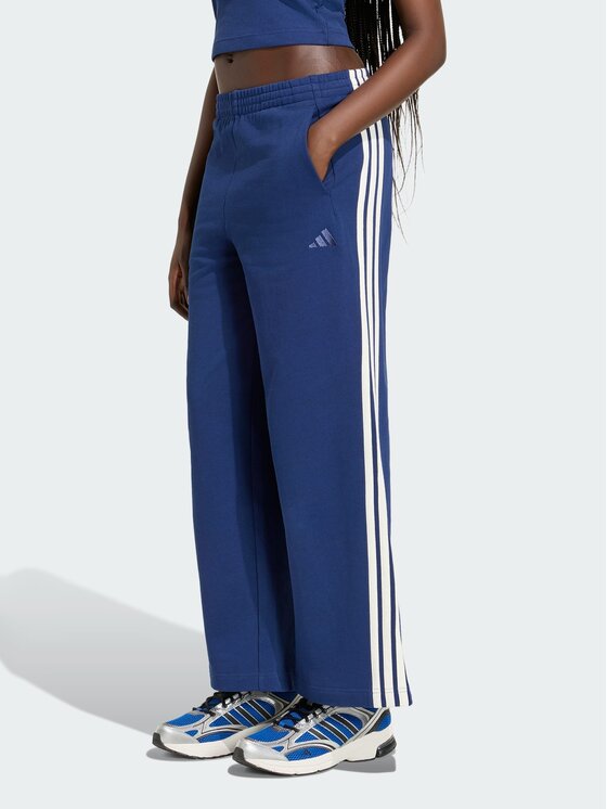 adidas adidas Spodnie materiałowe 164808 Niebieski Loose Fit