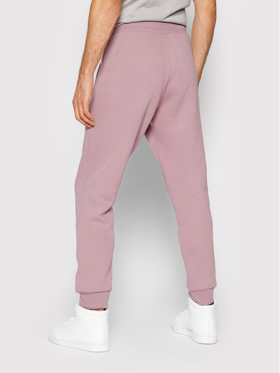adidas adidas Долнище анцуг adicolor Essentials HE9411 Виолетов Slim Fit