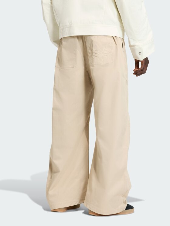 adidas adidas Spodnie materiałowe PREMIUM ESSENTIALS WIDE Beżowy Loose Fit