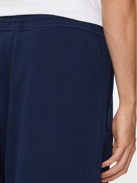 adidas adidas Pantaloni scurți sport Essentials Trefoil IY8521 Bleumarin Regular Fit