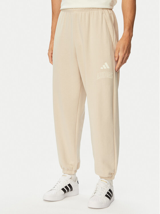 adidas Pantaloni trening Seasonal Essentials Collegiate French Terry Cuffed KF4265 Bej Regular Fit