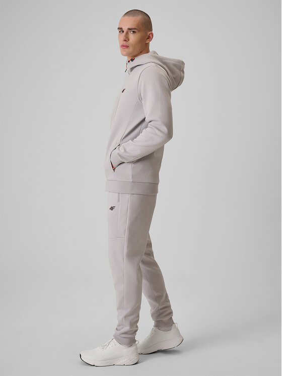 4F 4F Spodnie dresowe MONOCHROME MOVEMENT Szary jasny Regular Fit