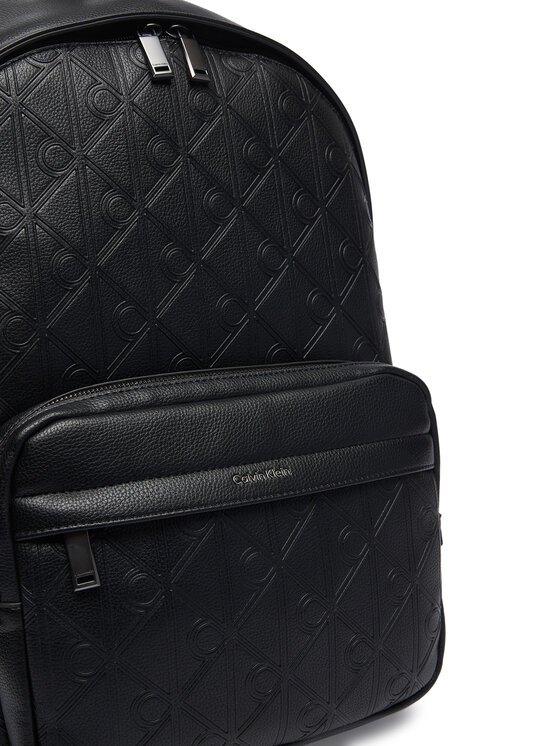 Calvin Klein Calvin Klein Seljakott Emblem Aop Deboss Round Backpack LV04D3560G Must