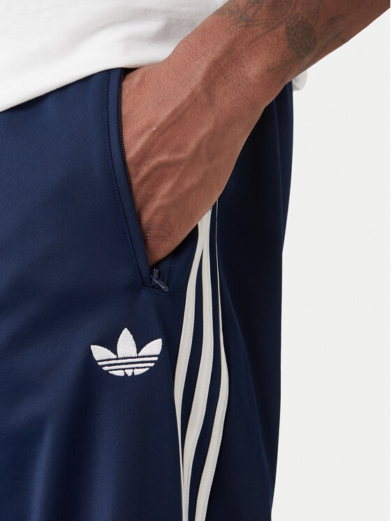 adidas adidas Teplákové kalhoty Firebird KD8316 Tmavomodrá Loose Fit