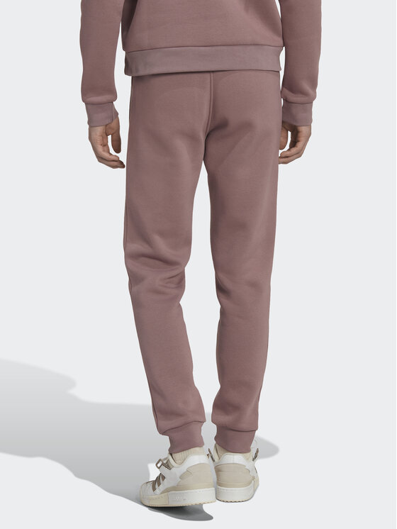 adidas adidas Spodnie dresowe adicolor Essentials Trefoil HK0105 Różowy Slim Fit