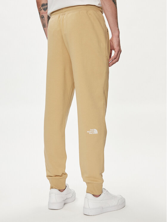 The North Face The North Face Παντελόνι φόρμας Nse Light NF0A4T1F Μπεζ Regular Fit