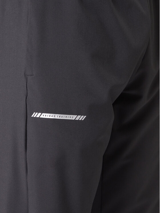 adidas adidas Долнище анцуг Training Essentials Holiday JM5441 Черен Regular Fit