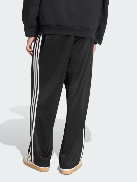 adidas adidas Spodnie dresowe ADICOLOR LOOSE Czarny Loose Fit
