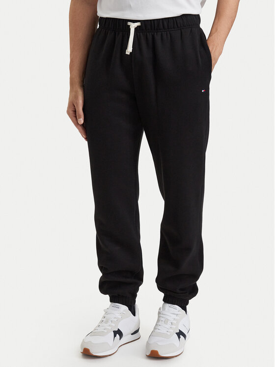 Tommy Hilfiger Donji dio trenerke Essential MW0MW37231 Crna Relaxed Fit