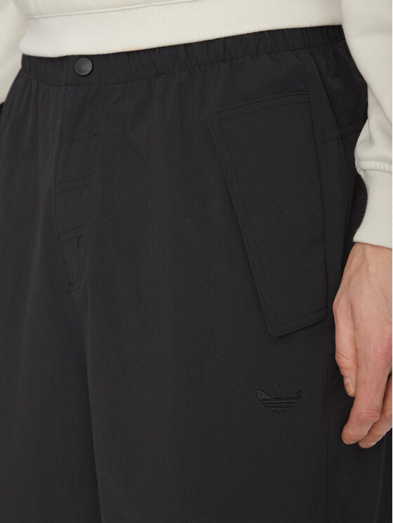 adidas adidas Pantaloni din material Premium Essentials Utility Parachute JD2111 Negru Loose Fit