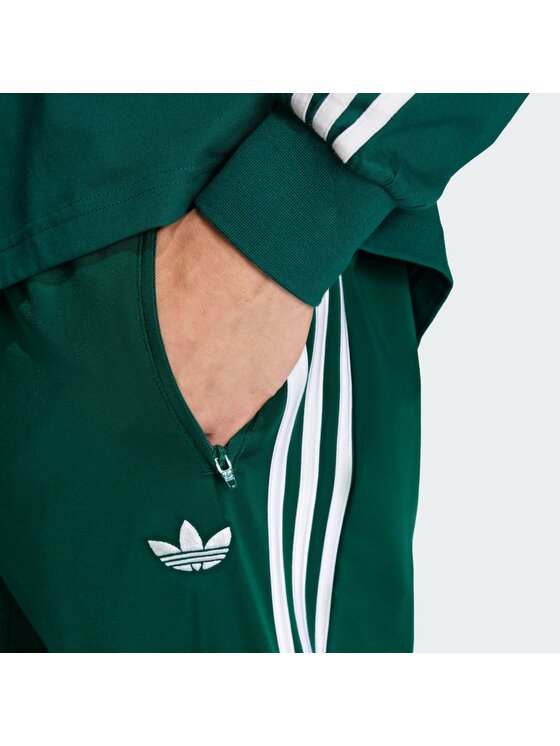 adidas adidas Pantaloni da tuta Firebird KD8317 Verde Loose Fit