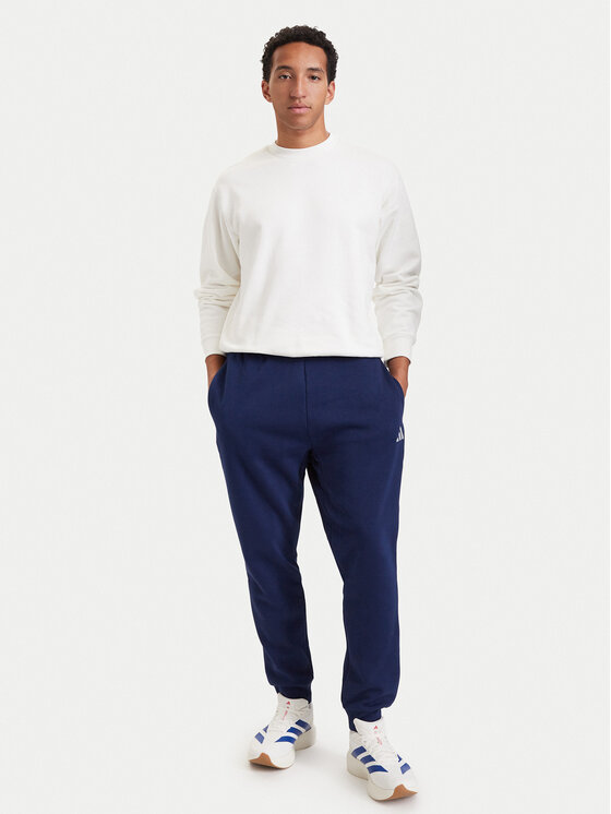 adidas adidas Долнище анцуг Essentials Feelcozy JE3814 Син Regular Fit