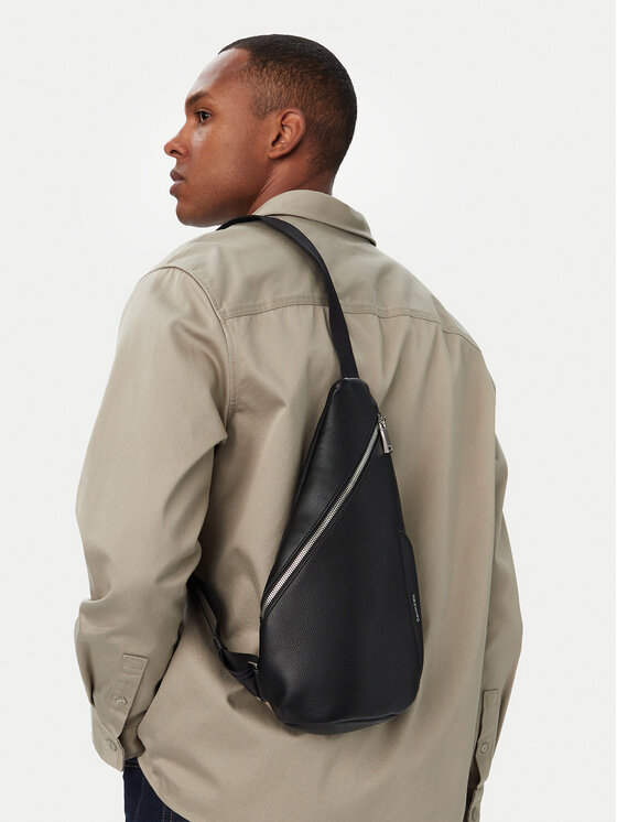 Calvin Klein Torbica za okrog pasu Raised Ns Sling LV04D3495G Črna