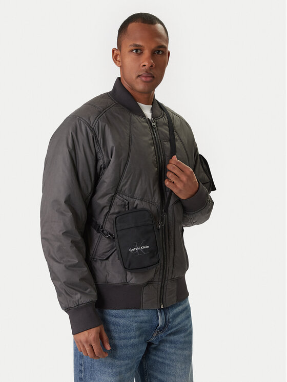 Calvin Klein Calvin Klein Torbica za okrog pasu Bold Logo Nylon Slim Reporter LV04D3231G Črna