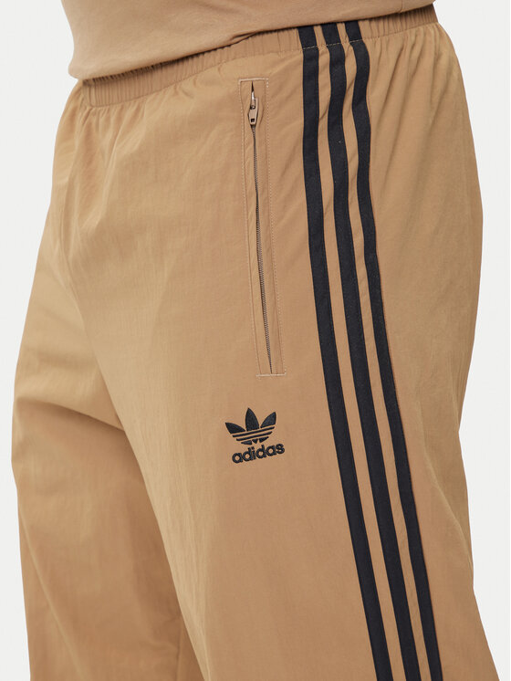 adidas adidas Spodnie dresowe adicolor Woven Firebird JY1339 Beżowy Regular Fit