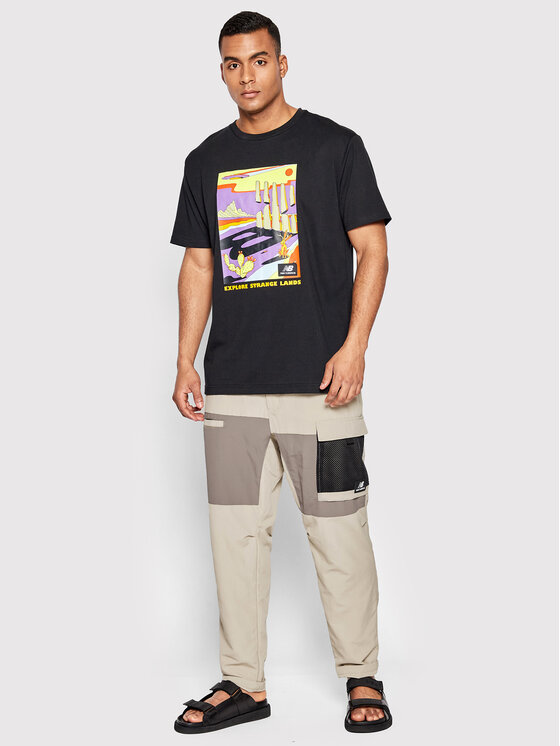 New Balance New Balance Spodnie materiałowe MP21502 Beżowy Relaxed Fit