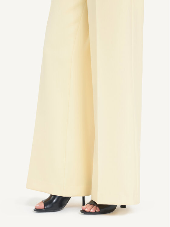 KMX KMX Spodnie materiałowe 810140023 Żółty Flare Fit