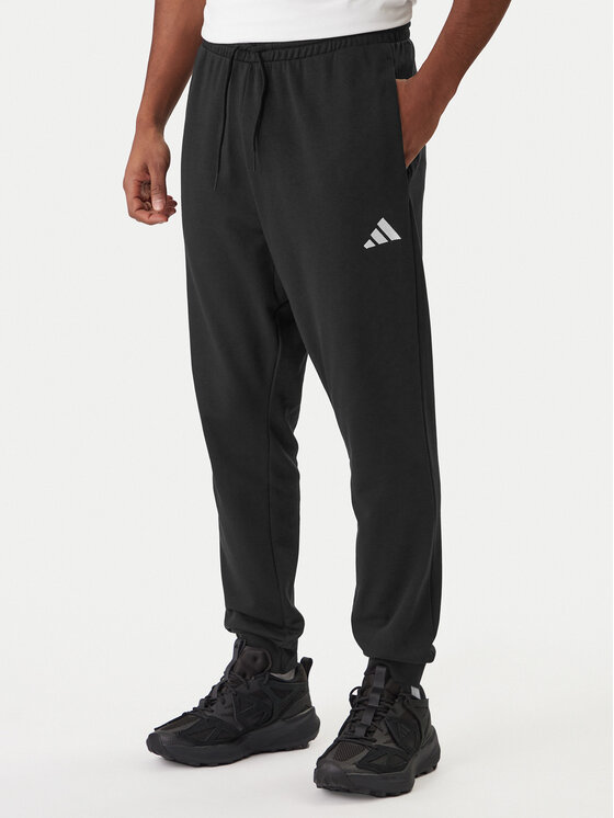 adidas Pantaloni trening Essentials Feel Cozy JE3854 Negru Regular