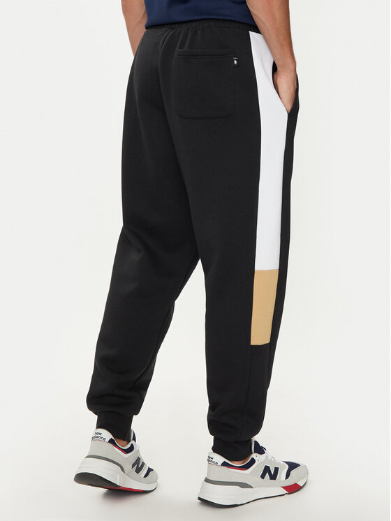 New Balance New Balance Spodnji del trenirke MP43522BK Črna Relaxed Fit