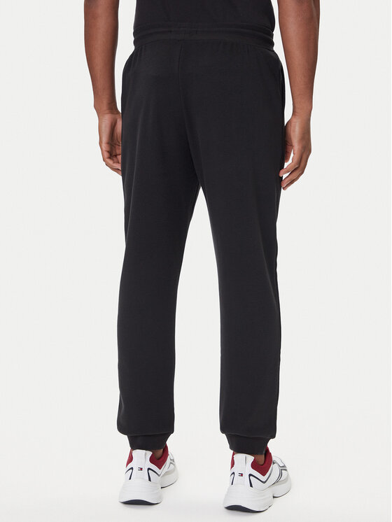 Tommy Hilfiger Tommy Hilfiger Melegítő alsó UM0UM03664 Fekete Regular Fit