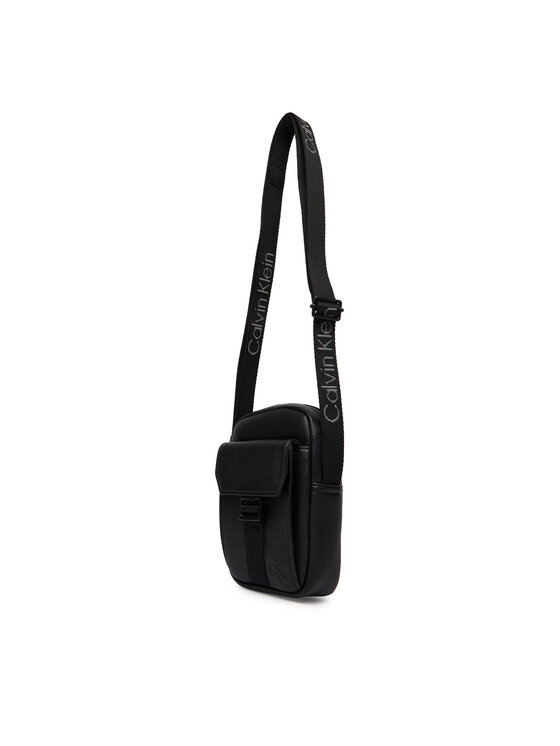 Calvin Klein Calvin Klein Brašna Webbing Strap Slim Reporter LV04D3281G Černá