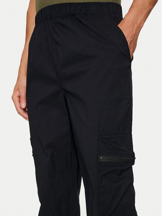 Rains Rains Kalhoty z materiálu Tomar Pants Regular 19300 Černá Regular Fit