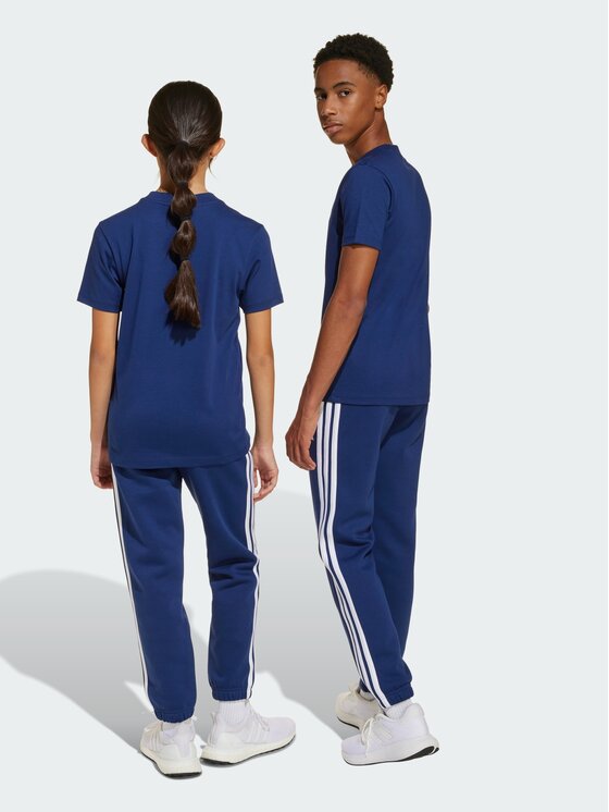 adidas adidas Spodnie materiałowe 141033 Niebieski jasny Regular Fit
