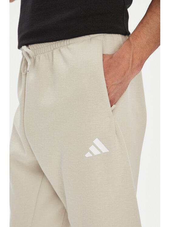 adidas adidas Donji dio trenerke Future Icons 3-Stripes JW7092 Bež Regular Fit
