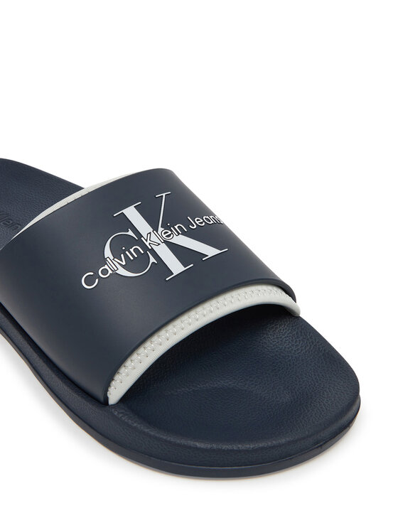Calvin Klein Jeans Calvin Klein Jeans Klapki Slide Rubber Neoprene Monologo YM0YM00361 Granatowy