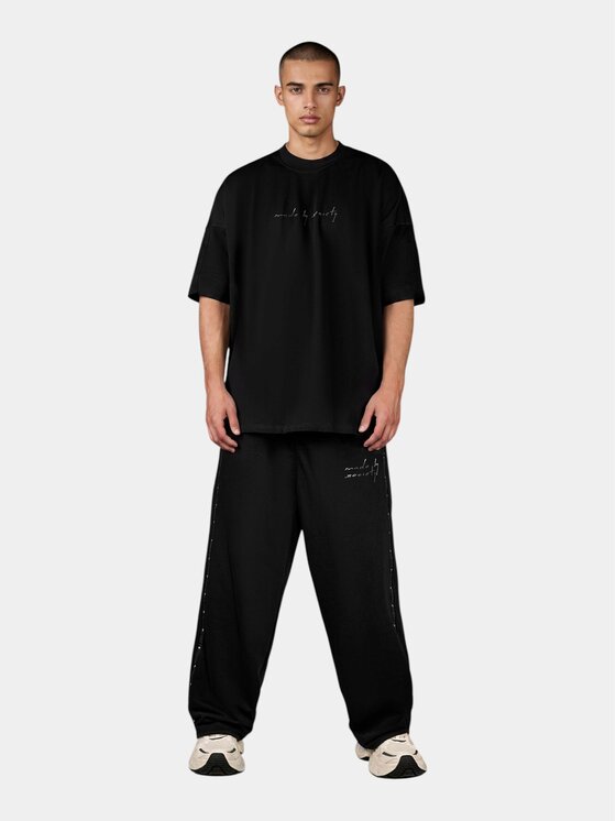 MADE BY SOCIETY MADE BY SOCIETY Spodnie materiałowe Pantaloni Nomad Rust - P17154 Czarny Basic Fit