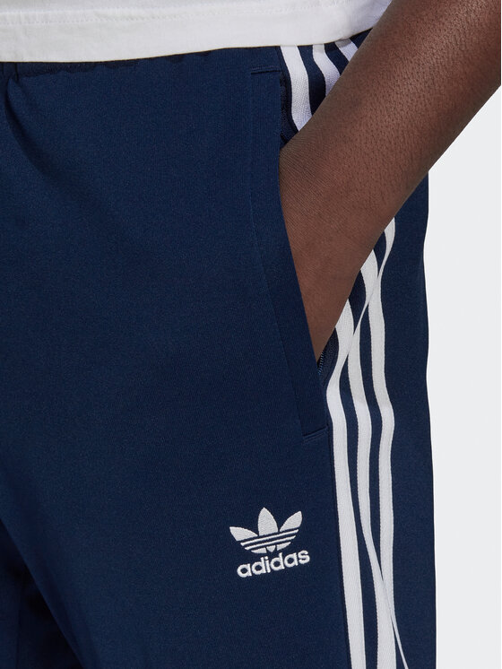 adidas adidas Спортивні штани ADICOLOR CLASSICS PRIMEBLUE SST Tracksuit Bottom HK7353 Голубий Slim Fit