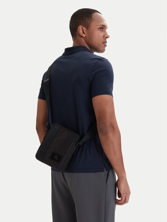 Calvin Klein Calvin Klein Torbica za okrog pasu Canvas Mix Reporter LV04D3366G Črna