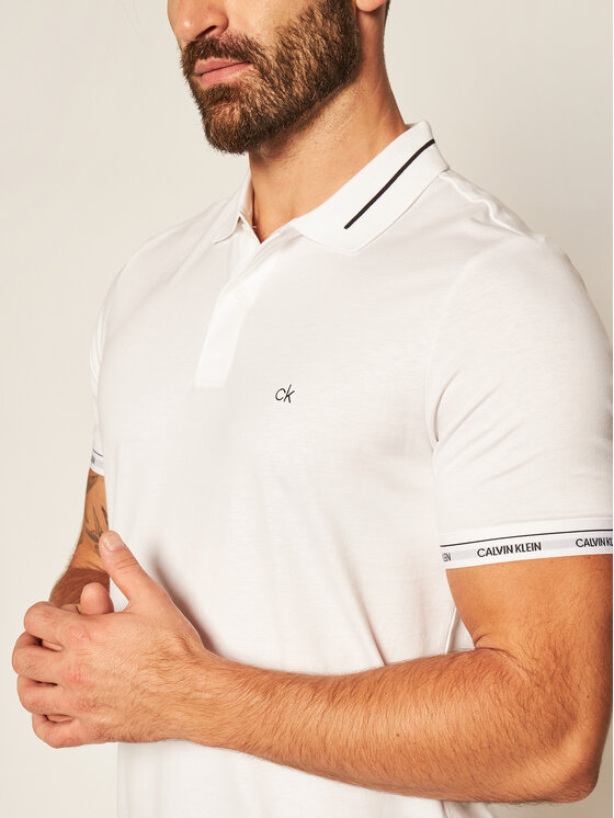 Calvin Klein liquid touch logo cuff polo in white