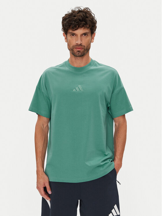 adidas adidas T-Shirt ALL SZN JX5085 Turkusowy Loose Fit