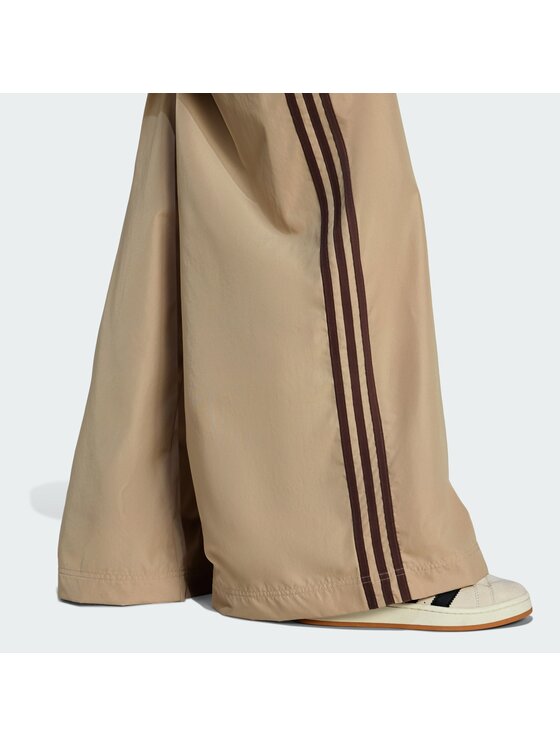 adidas adidas Долнище анцуг Firebird Adilenium KD6300 Бежов Regular Fit