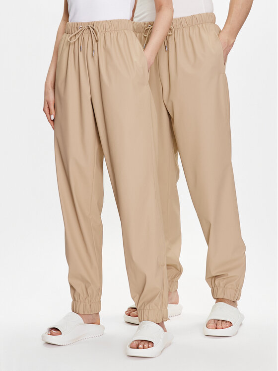 Rains Hlače iz tkanine Unisex 18560 Bež Comfortable Fit