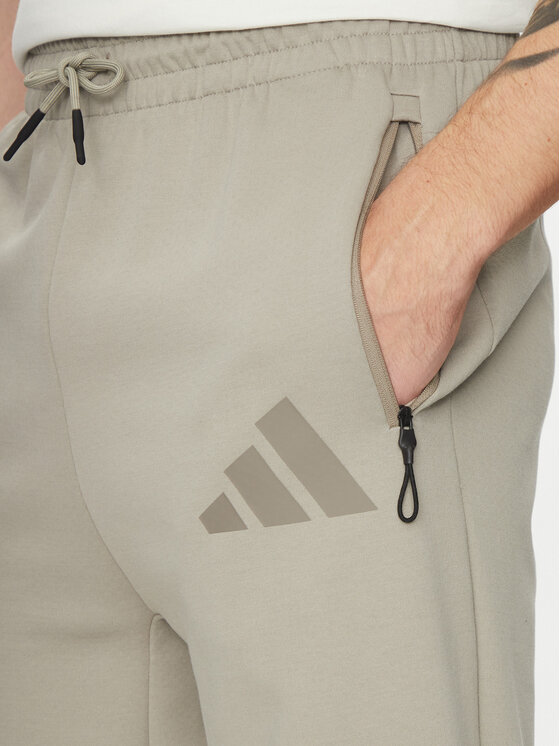 adidas adidas Spodnie dresowe Z.N.E. Open-Hem JC6716 Beżowy Loose Fit