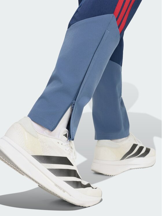 adidas adidas Spodnie materiałowe 168868 Niebieski jasny Regular Fit