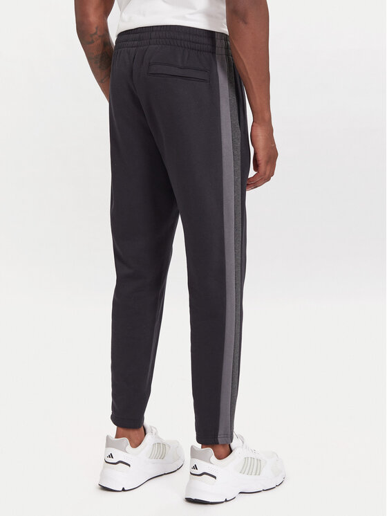 Under Armour Under Armour Teplákové nohavice Ua Rival Fleece Colorblock 6003954 Čierna Loose Fit