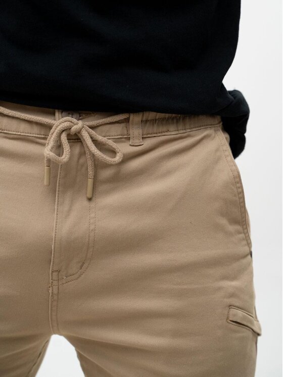 MyStars MyStars Spodnie materiałowe joggery karmel Klasyczne 6 kieszeni 34 Brązowy Regular Fit