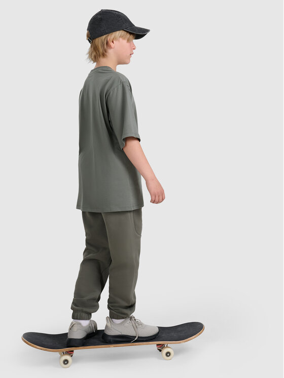 4F 4F Spodnie dresowe URBAN COMMUTER Szary ciemny Loose Fit
