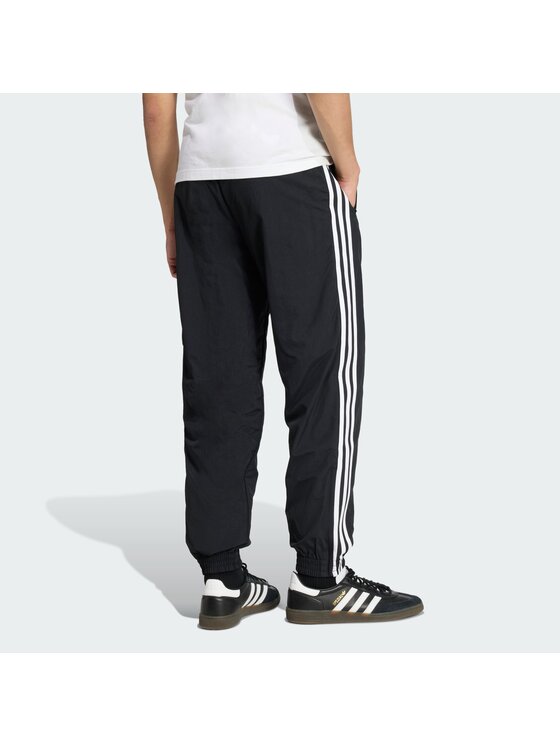 adidas adidas Παντελόνι φόρμας Firebird Woven KE1371 Μαύρο Regular Fit