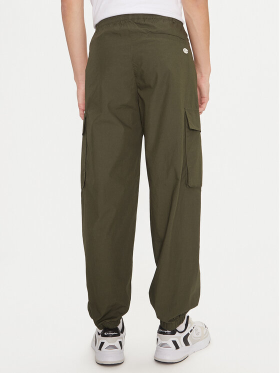 Champion Champion Spodnji del trenirke 220415 Zelena Loose Fit