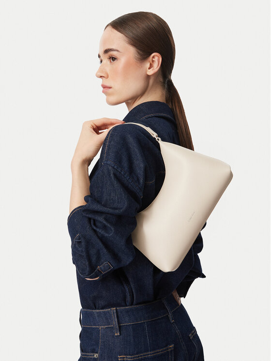 Calvin Klein Ročna torba Foil Logo Small Shoulder Bag LV04F3890G Kremna