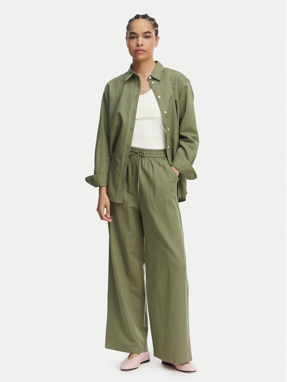 Tommy Jeans Tommy Jeans Hlače iz tkanine DW0DW22285 Zelena Loose Fit