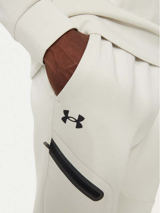 Under Armour Under Armour Spodnie dresowe UA Unstoppable 1389353 Écru Loose Fit