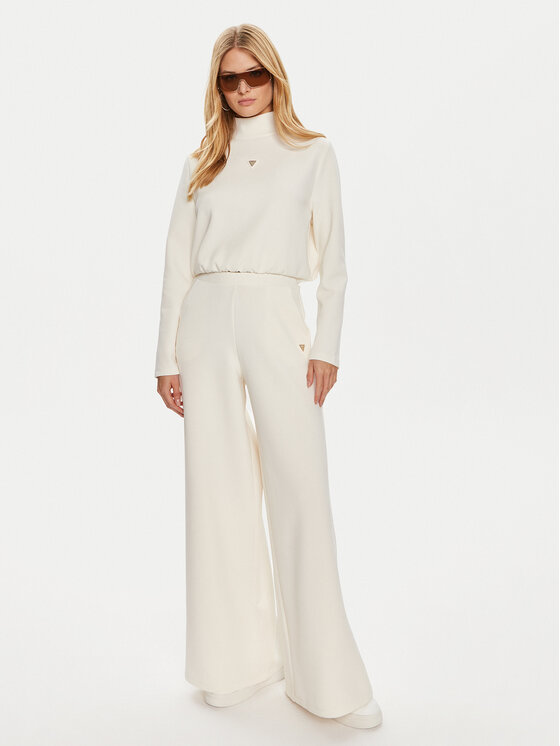 Guess Guess Spodnie dresowe Olympe V4YB07 KCAY2 Beżowy Relaxed Fit